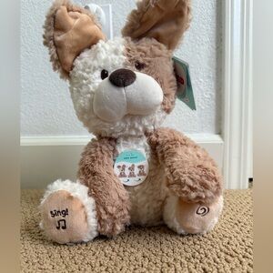 GUND Baby Peeki the Puppy animated plush toy.